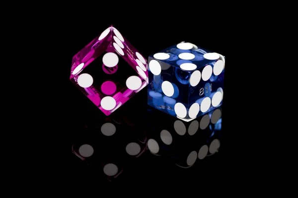 Live dealer dealing cards at blackjack table